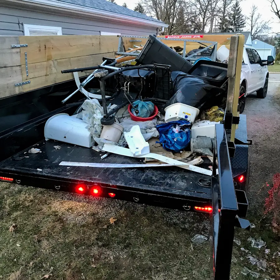 Roll-off dumpster delivered to a residential driveway in Iona