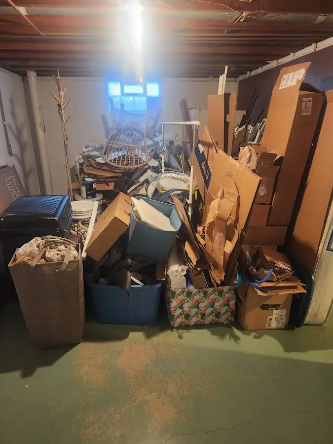 Roll-off dumpster container at job site for 8 Yard Dumpster Rental in Iona